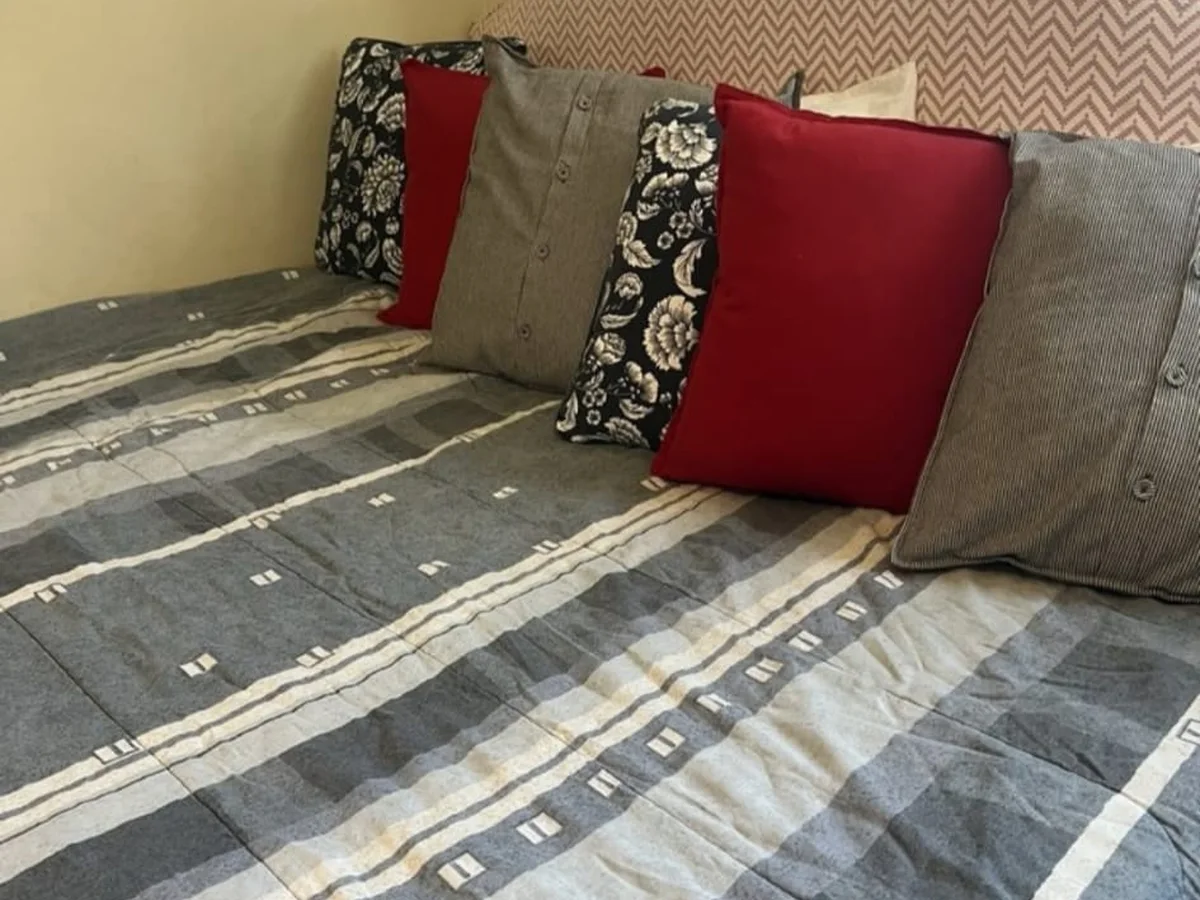 Made bed with fresh linens