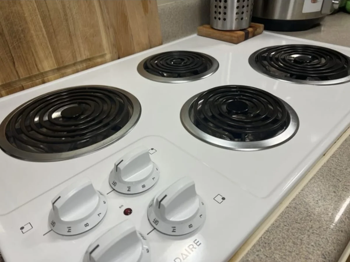 Cooktop scrubbed clean, burner by burner